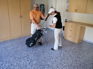 Residential Garage Cabinetry in Tan and Roll on Rock® Flooring System