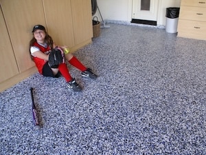 Residential Garage Cabinetry in Tan and Roll on Rock® Flooring System